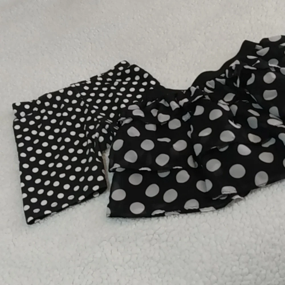 Girls black and white polka dot skirt and shorts‎